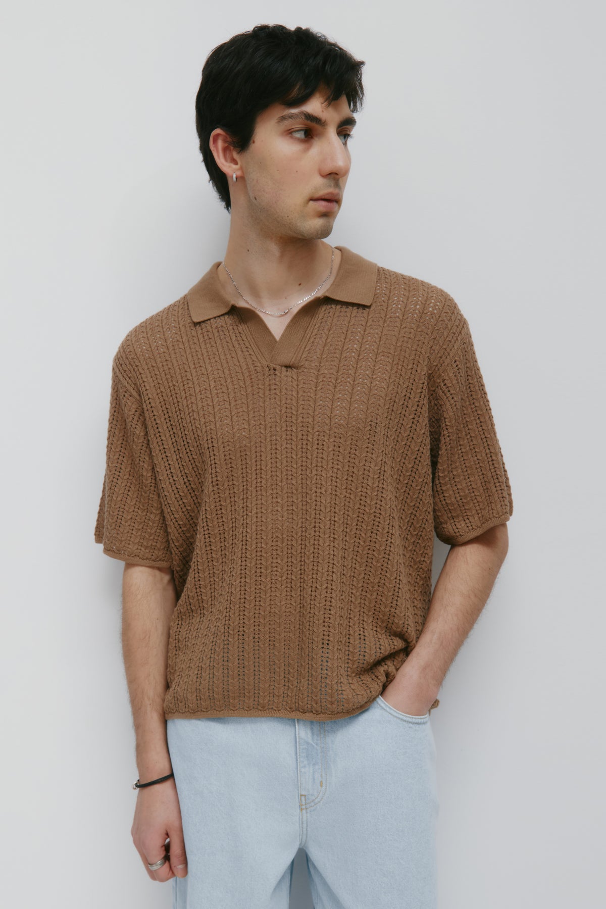 Model is 6’1” and is wearing a size L.