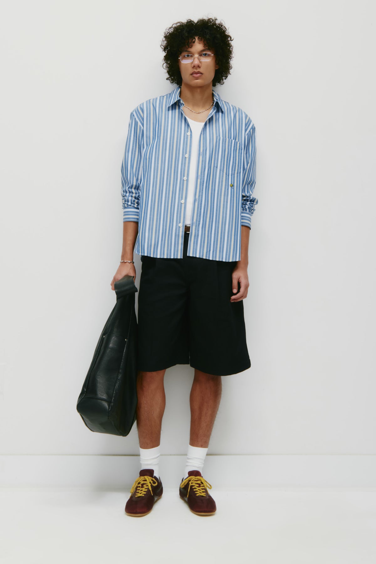 Model is 6’2” and is wearing a size L.